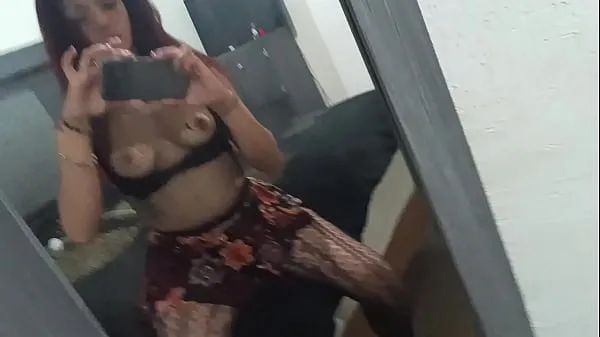 Show whore in lingerie shows her butt and her tits, she likes to walk like that in the street clips Movies